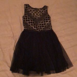 Black and gold v neck dress